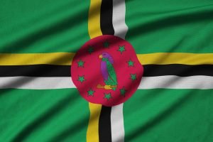 dominica-flag-is-depicted-on-a-sports-cloth-fabric-N4CJ8BD
